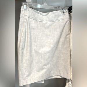 The limited gray pencil skirt